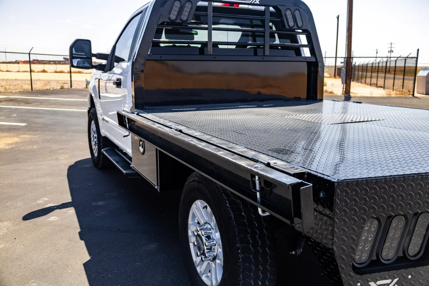 Legend X fold-down side rail lowered alongside the bed for loading access
