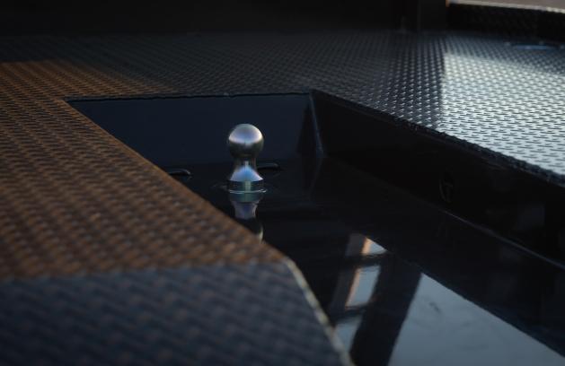 Integrated gooseneck trough in a Legend X treadplate deck