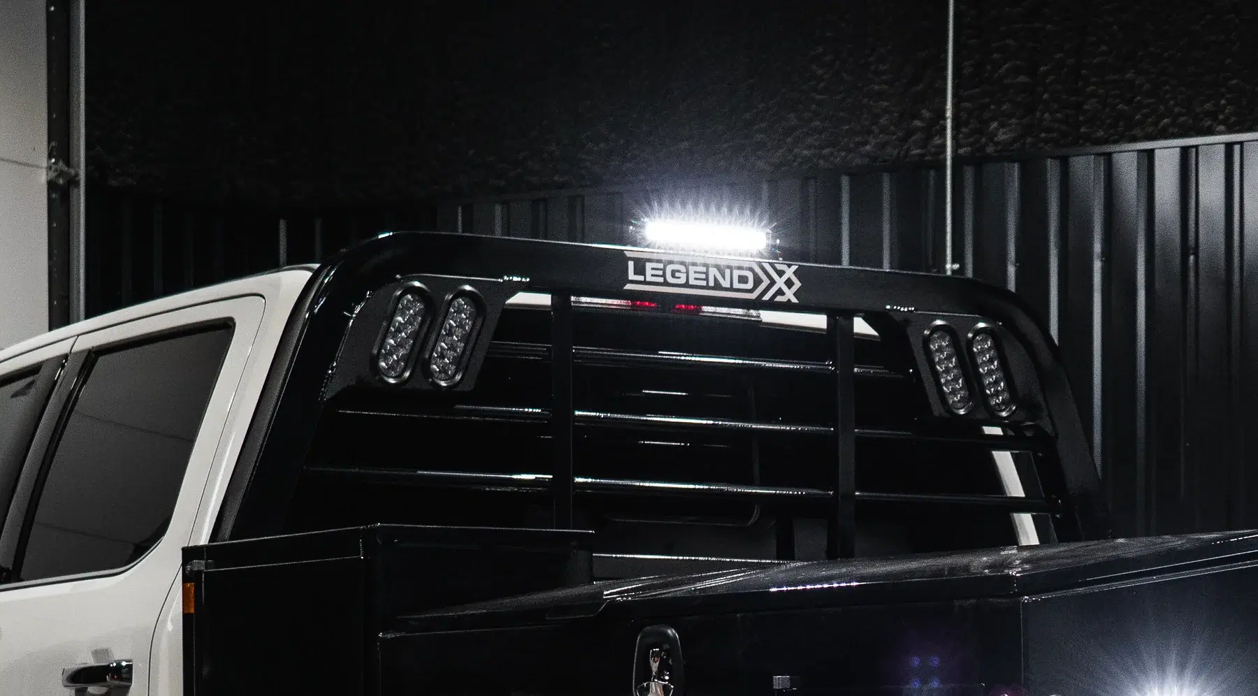 LED light bar lit up on a Legend X headache rack